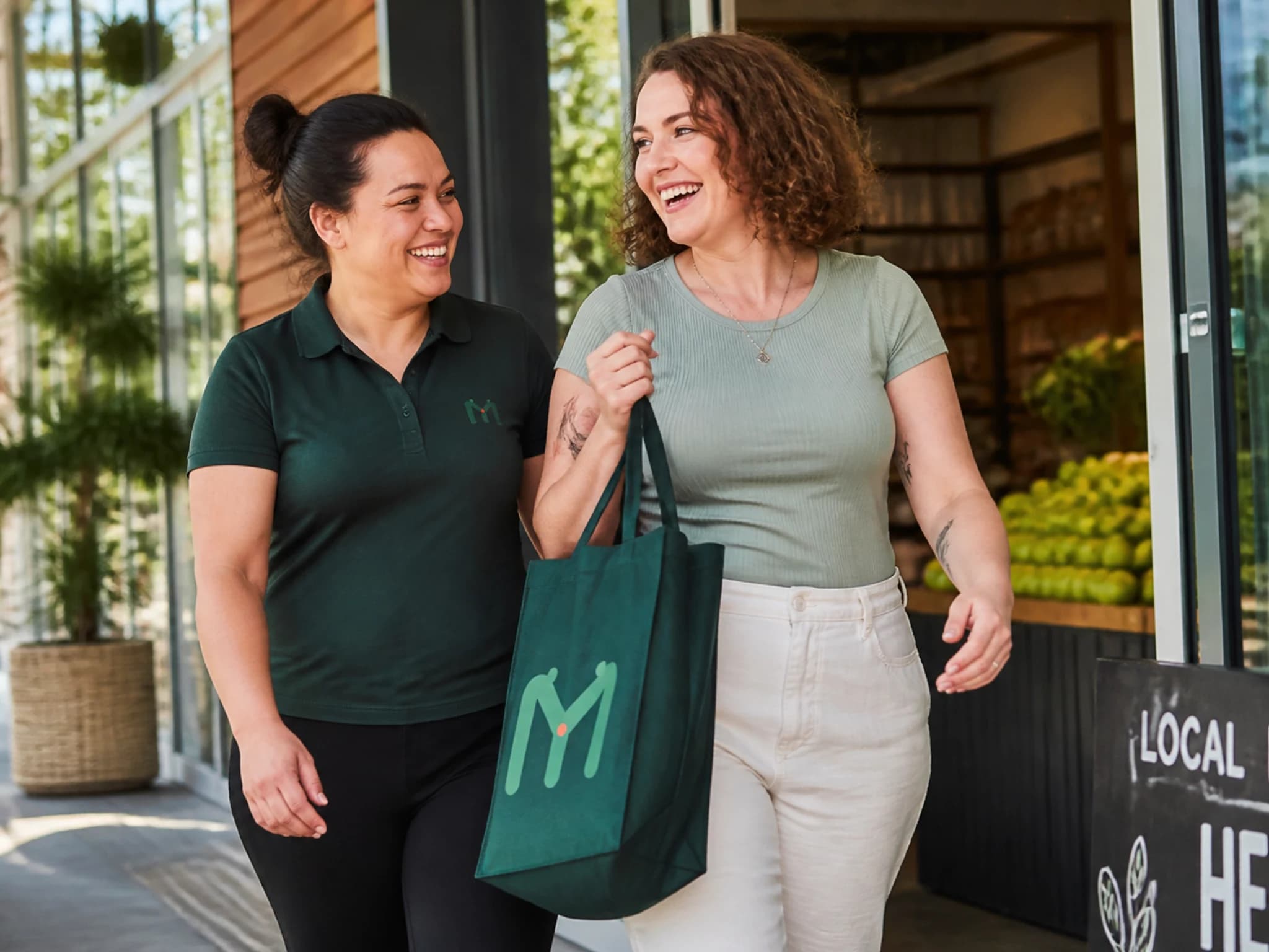An adult practising a community shopping task with an allied health assistant